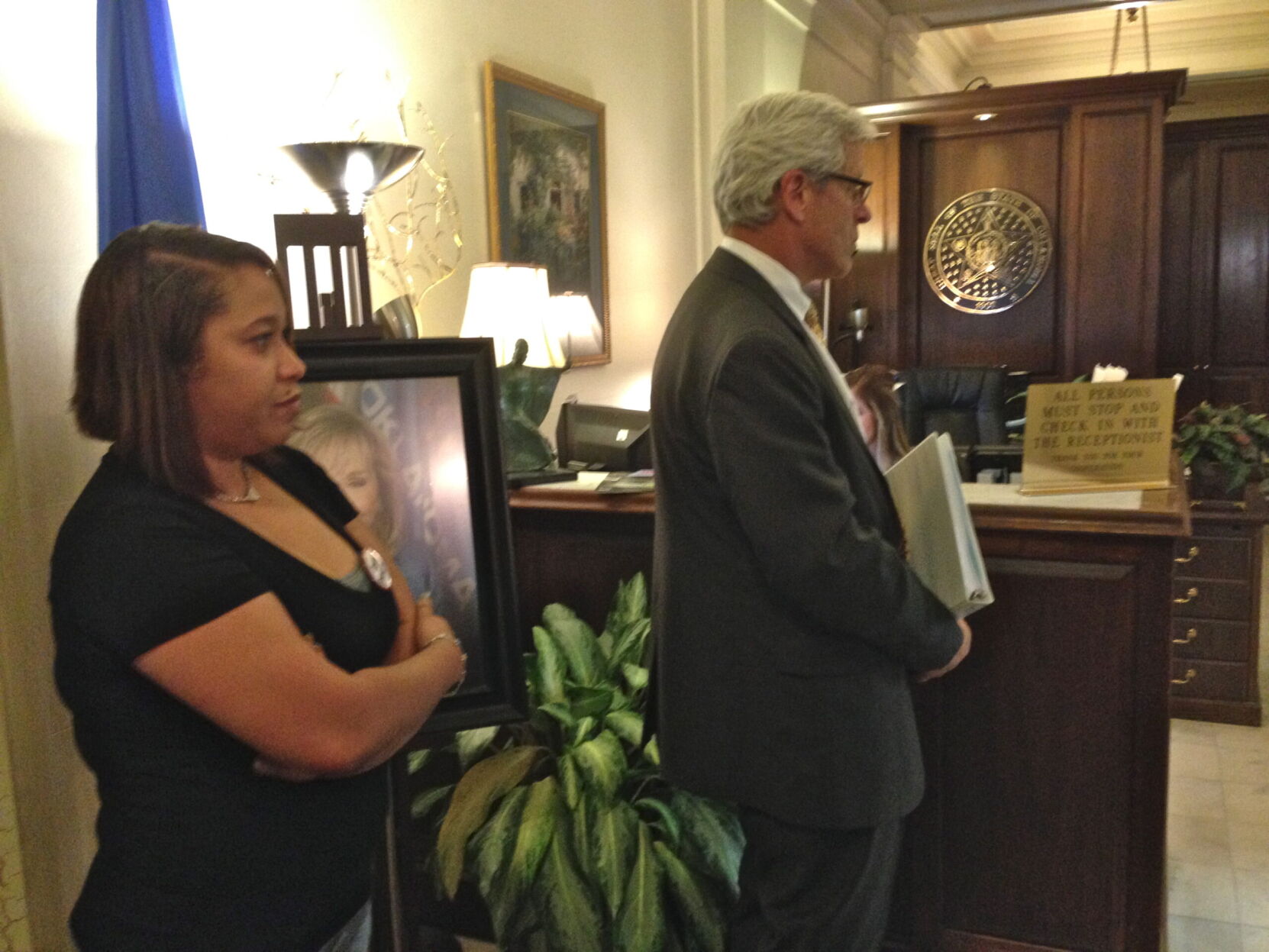 Erika Glossip Hodge and Don waiting